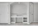 Finished basement includes a built-in desk area, perfect for an office or homework station at 7511 S Sicily Way, Aurora, CO 80016