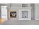 Cozy fireplace featuring decorative tiling at 7511 S Sicily Way, Aurora, CO 80016
