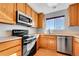 Kitchen with stainless steel appliances at 7511 S Sicily Way, Aurora, CO 80016