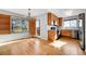 Kitchen featuring stainless steel appliances and hardwood flooring at 7511 S Sicily Way, Aurora, CO 80016
