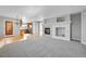 Inviting living room with fireplace, hardwood floors, and bright, open layout at 7511 S Sicily Way, Aurora, CO 80016