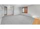Spacious living room with carpet and lots of natural light at 7511 S Sicily Way, Aurora, CO 80016