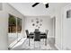 Dining area with sliding glass door and modern decor, perfect for entertaining at 807 Mobile St, Aurora, CO 80011