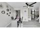 Stylish dining room with modern decor, seamlessly connecting to other living spaces for easy entertaining at 807 Mobile St, Aurora, CO 80011