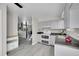 Efficient kitchen with neutral cabinets, modern appliances, and an open layout, perfect for cooking and entertaining at 807 Mobile St, Aurora, CO 80011