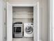 Convenient laundry room with modern washer and dryer units at 807 Mobile St, Aurora, CO 80011