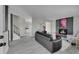 Open concept living room with fireplace, and staircase, perfect for modern living at 807 Mobile St, Aurora, CO 80011