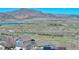 Enjoy picturesque mountain views from this home's location, featuring nearby lakes and easy highway access at 4142 S Deframe Ct, Morrison, CO 80465