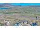 Expansive aerial view of a community with mountain views, highway access, and nearby lakes, with a great neighborhood at 4142 S Deframe Ct, Morrison, CO 80465