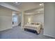 Basement bedroom features carpet and a comfortable bed, perfect for relaxation at 4142 S Deframe Ct, Morrison, CO 80465