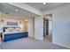Spacious basement bedroom with carpet floors and easy access to storage through a doorway at 4142 S Deframe Ct, Morrison, CO 80465