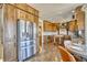 Gourmet kitchen boasting custom wood cabinetry, granite countertops, and state-of-the-art stainless steel appliances at 4142 S Deframe Ct, Morrison, CO 80465