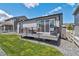 Beautiful backyard features a cozy deck and well-manicured lawn at 1868 Makley Loop, Castle Rock, CO 80104