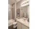 Well-lit bathroom features a shower-tub combo and a stylish vanity area at 1868 Makley Loop, Castle Rock, CO 80104