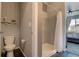 Modern bathroom featuring a shower, toilet, and stylish decor at 1868 Makley Loop, Castle Rock, CO 80104