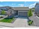 Charming single-Gathering home with a two-car garage and well-maintained landscaping at 1868 Makley Loop, Castle Rock, CO 80104