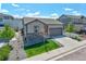 Charming single-Gathering home with a well-manicured front yard and inviting curb appeal at 1868 Makley Loop, Castle Rock, CO 80104