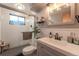Modern bathroom featuring a glass shower, updated vanity, and stylish fixtures for a spa-like feel at 6445 Balsam St, Arvada, CO 80004