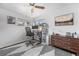 Cozy bedroom with a desk, a large mirror and a dresser, providing both style and functionality at 6445 Balsam St, Arvada, CO 80004