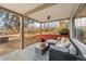 Outdoor patio featuring a cozy seating area, rug, and views of the private backyard at 6445 Balsam St, Arvada, CO 80004