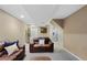 Basement living room features comfortable seating and neutral paint at 8433 S Painted Sky St, Highlands Ranch, CO 80126