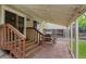 Covered patio featuring a picnic table, grill, and string lights, ideal for outdoor dining and entertaining at 8433 S Painted Sky St, Highlands Ranch, CO 80126