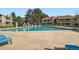 Large community pool with lounge chairs, perfect for relaxing on sunny days at 8225 Fairmount Dr # 104, Denver, CO 80247