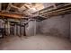 Unfinished basement area with utilities and potential for storage, perfect for customization at 131 Fox St, Denver, CO 80223