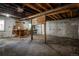 Spacious unfinished basement with exposed beams, perfect for storage or future renovation projects at 131 Fox St, Denver, CO 80223