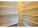 Spacious walk-in closet with ample shelving for organized storage at 131 Fox St, Denver, CO 80223