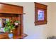 Beautiful interior detail with stained glass window, decorative wood shelf and wooden trim detail at 131 Fox St, Denver, CO 80223