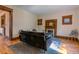 Spacious living room with hardwood floors, a decorative fireplace, and stylish furnishings at 131 Fox St, Denver, CO 80223
