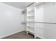 Well-organized closet with built-in shelving and ample hanging space at 3470 S Poplar St # 404, Denver, CO 80224
