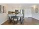 Cozy living space with a modern kitchen and dining area, perfect for entertaining at 3470 S Poplar St # 404, Denver, CO 80224