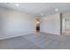 Large bedroom boasts soft carpet and access to en suite bathroom at 9973 Worchester St, Commerce City, CO 80022