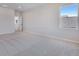 Inviting bedroom with soft carpet and a window offering natural light at 9973 Worchester St, Commerce City, CO 80022