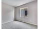 Neutral bedroom with carpet flooring, light grey walls and window with a view of neighboring home at 9973 Worchester St, Commerce City, CO 80022