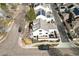 An aerial view of the back of a white home with a fenced in back yard at 6324 Winona St, Arvada, CO 80003