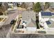 Aerial view of the home and surrounding neighborhood with mature trees at 6324 Winona St, Arvada, CO 80003