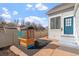 Outdoor play area featuring a slide and playhouse in a fenced backyard at 6324 Winona St, Arvada, CO 80003