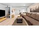 Spacious basement Gathering room featuring plush carpeting and comfortable seating area at 6324 Winona St, Arvada, CO 80003