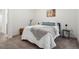 Cozy bedroom featuring carpet, neutral decor and natural light at 6099 N Netherland Ct, Aurora, CO 80019