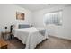Bedroom featuring carpet, natural light and calming decor at 6099 N Netherland Ct, Aurora, CO 80019