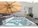 Relaxing hot tub with retractable cover at 6099 N Netherland Ct, Aurora, CO 80019