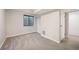 Finished basement bedroom with carpet, window, and closet space at 18 Brixham Ct, Castle Pines, CO 80108