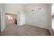 Neutral carpeted bedroom featuring vaulted ceiling and natural light at 18 Brixham Ct, Castle Pines, CO 80108