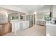 Modern kitchen featuring stainless steel appliances, granite countertops, and ample cabinet space at 18 Brixham Ct, Castle Pines, CO 80108
