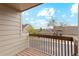 Balcony view of neighborhood with blue skies, mature trees, and neighboring homes at 1470 S Quebec Way # 178, Denver, CO 80231
