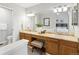 A spacious bathroom offers double sinks with ample counterspace and vanity seating at 1470 S Quebec Way # 178, Denver, CO 80231