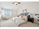 Spacious main bedroom offers a cozy feel with ample natural light and a vaulted ceiling at 1470 S Quebec Way # 178, Denver, CO 80231